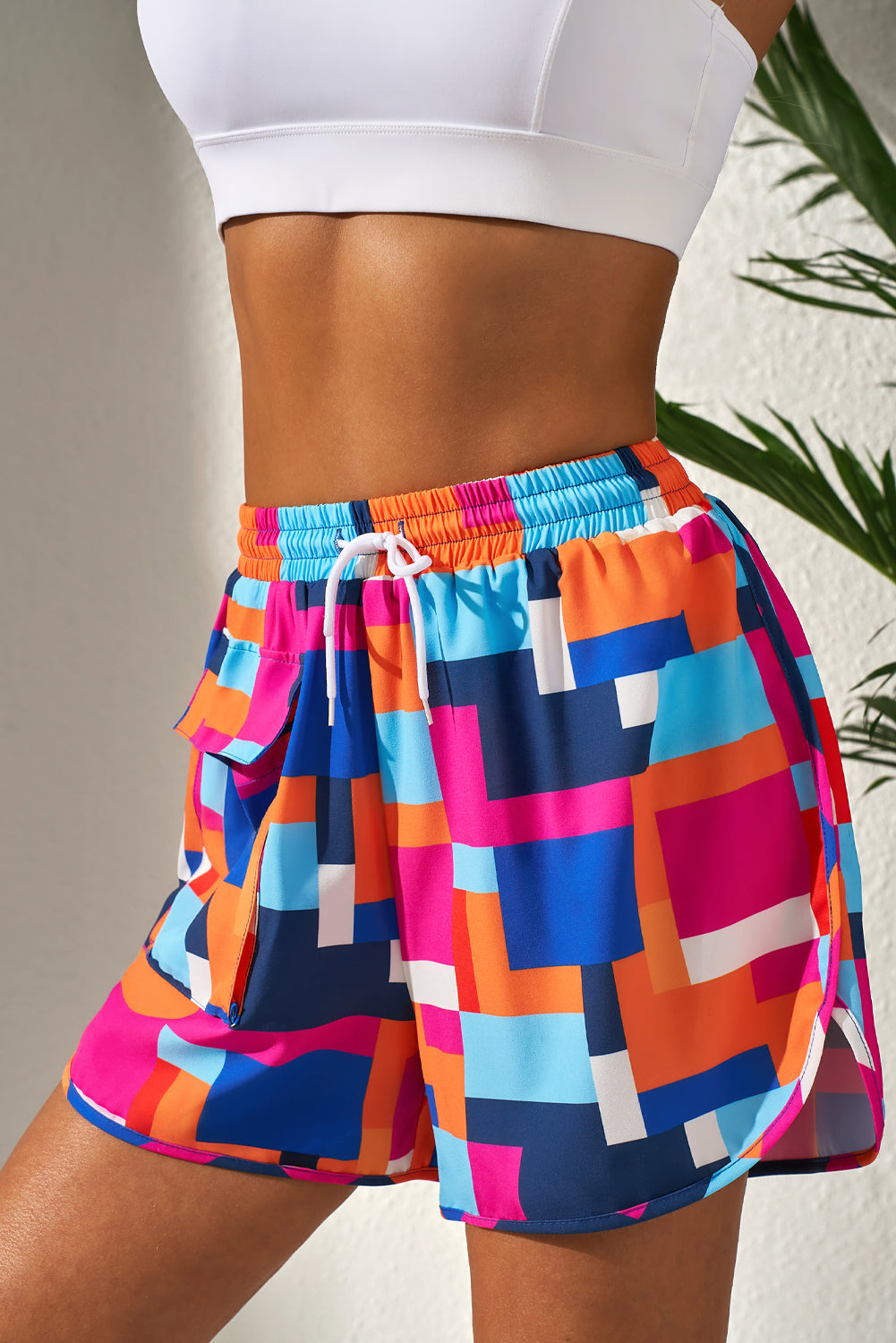 Pantalones cortos de playa con cintura con cordón y bolsillos y estampado geométrico de rosas