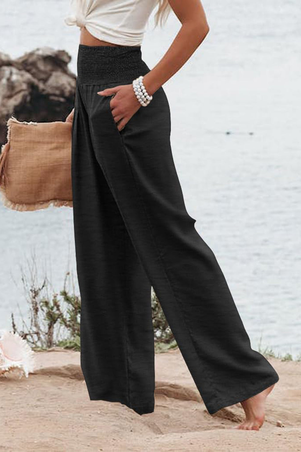 Pantalones anchos de talle alto con frunces negros y talla grande