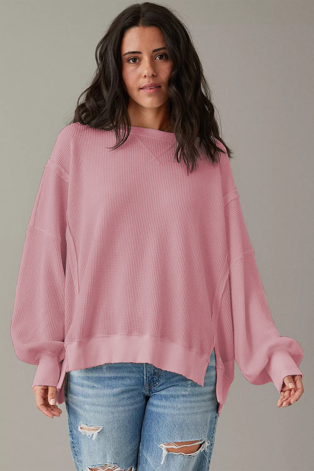 Top oversize con abertura y mangas obispo de punto gofre blanco