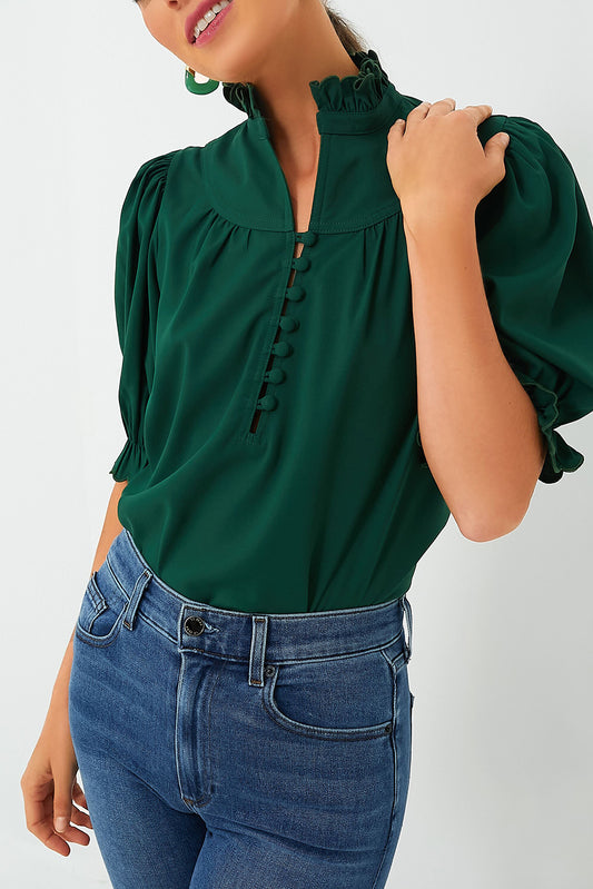 Blusa elegante con volantes y mangas abullonadas de color verde negruzco