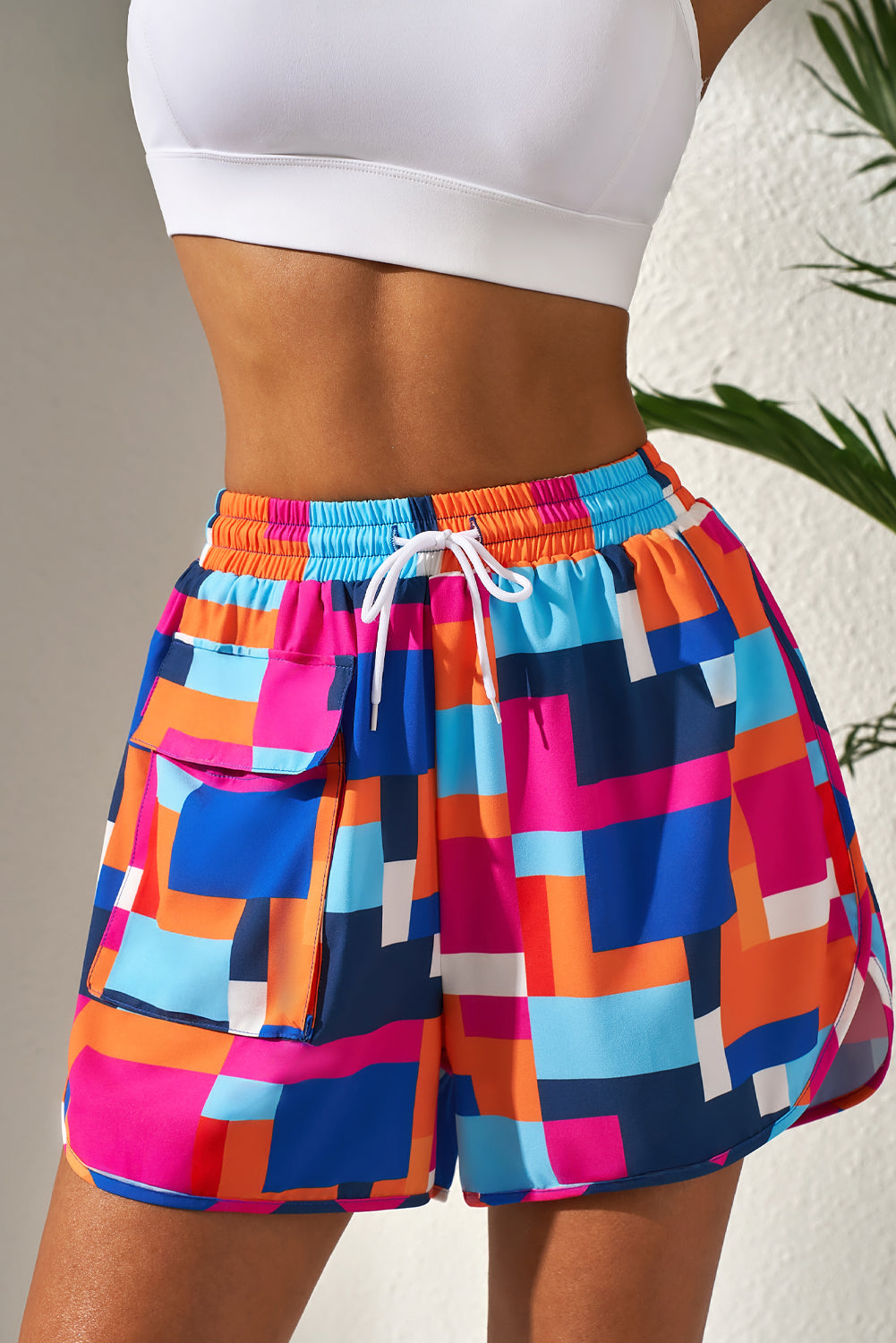 Pantalones cortos de playa con cintura con cordón y bolsillos y estampado geométrico de rosas