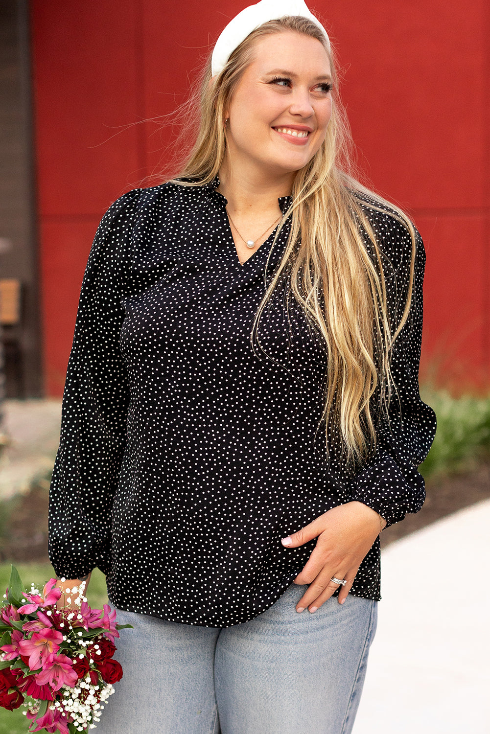 Blusa negra con escote en V y estampado de leopardo en talla grande