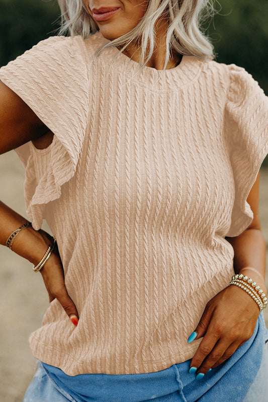 Blusa con mangas onduladas y textura en color beige liso