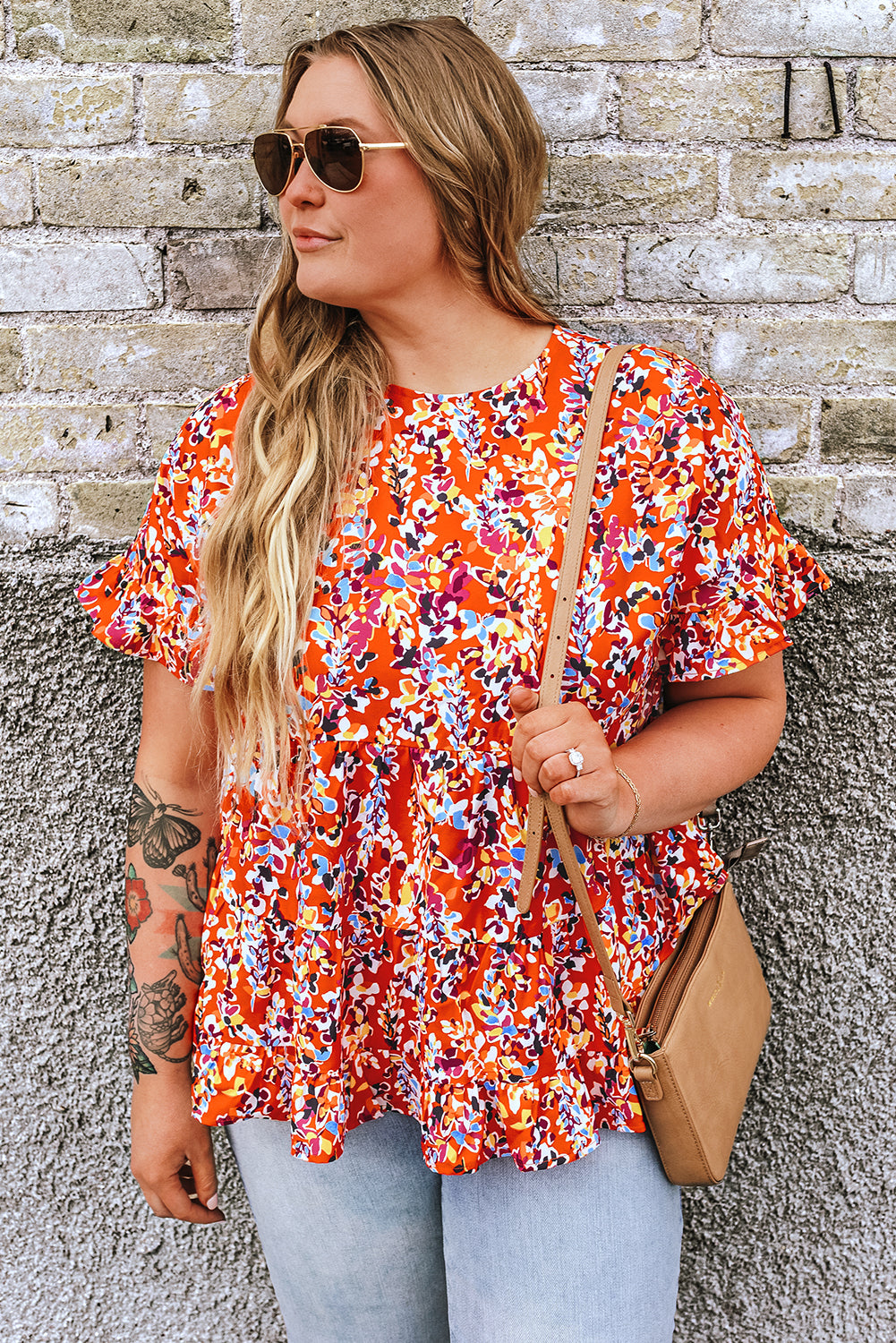 Blusa babydoll con volados y mangas con estampado floral en color naranja