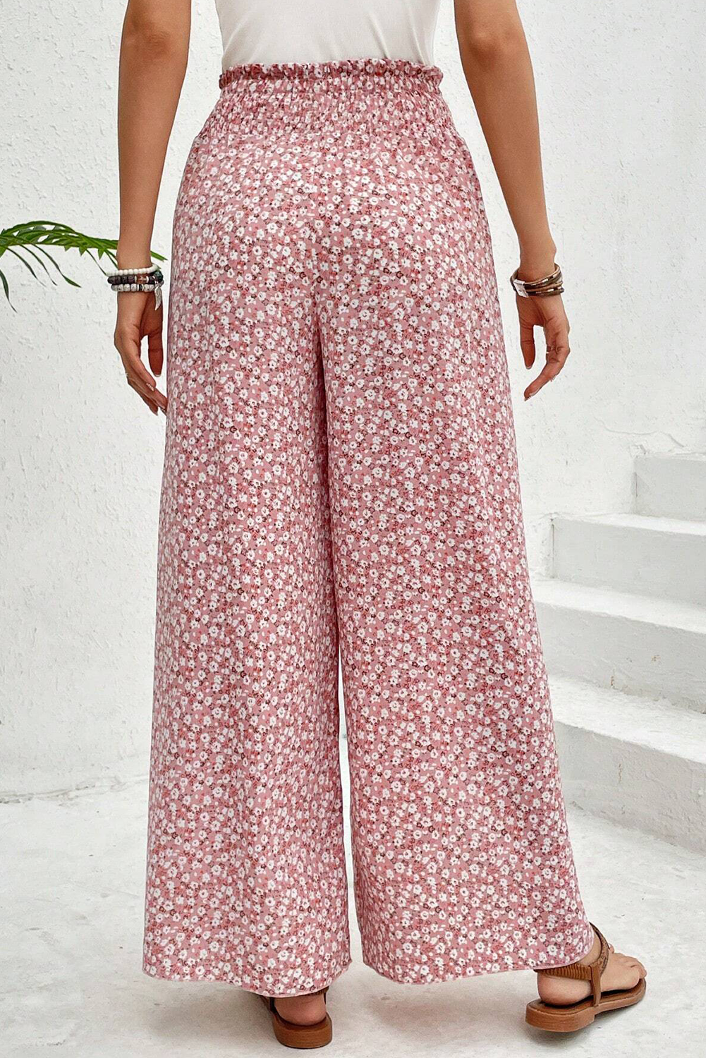 Pantalones de talle alto con abertura y pierna ancha con estampado bohemio negro