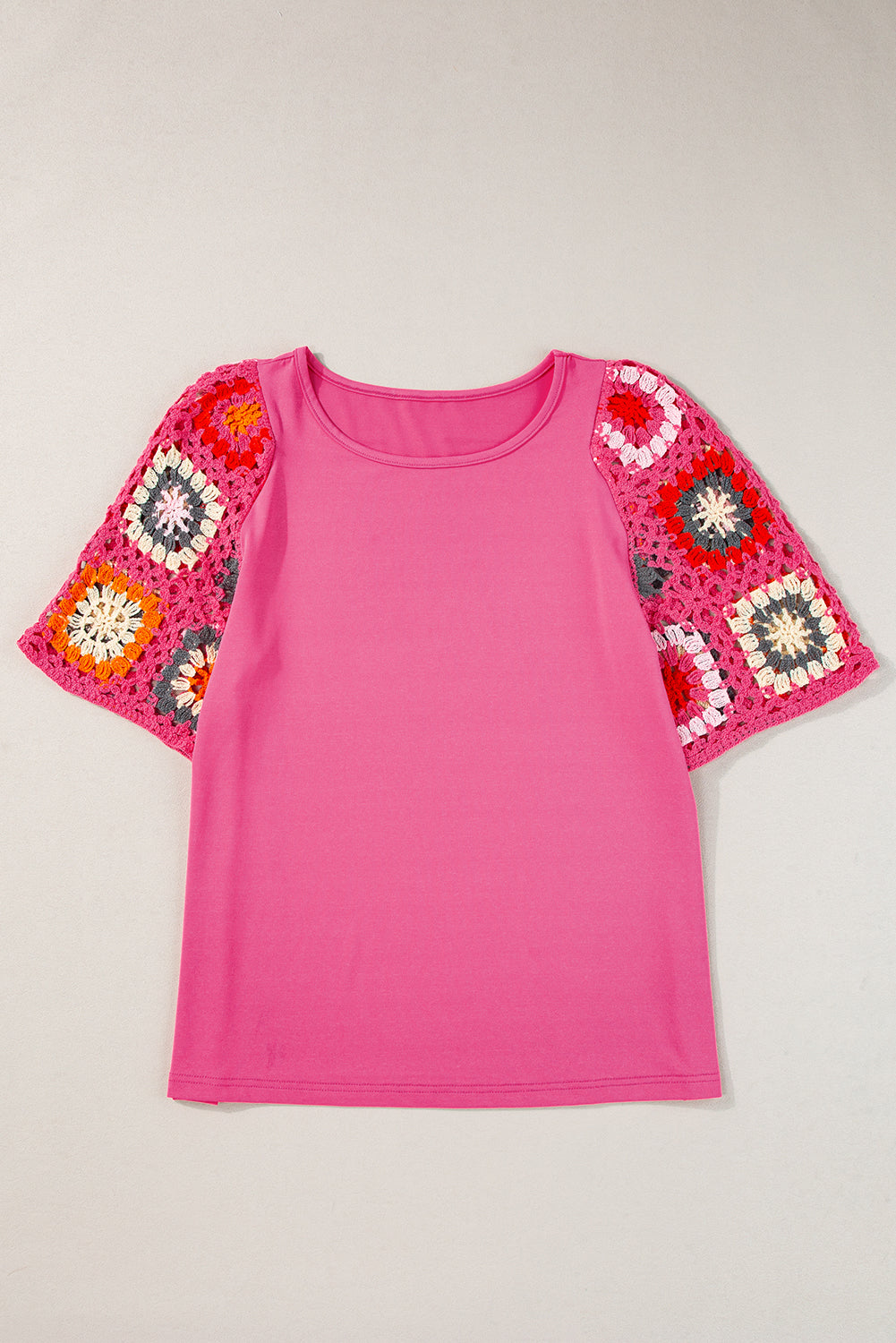 Blusa de manga corta tejida a crochet con flores color turquesa