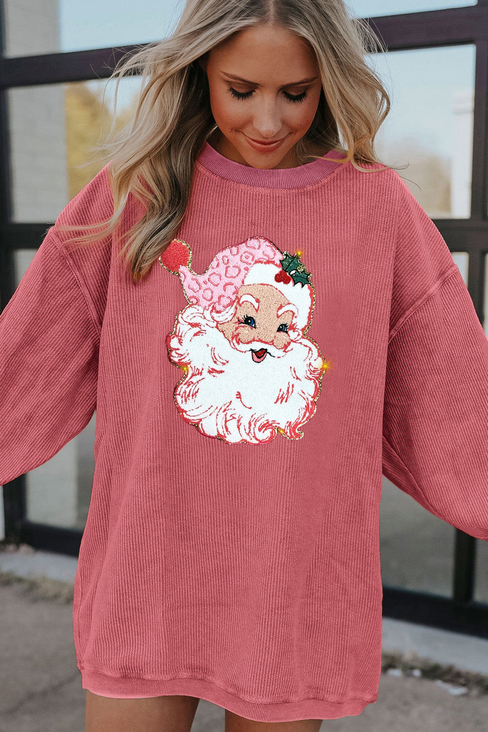 Sudadera con cuello redondo y cordón con destellos de Papá Noel en color rosa fresa