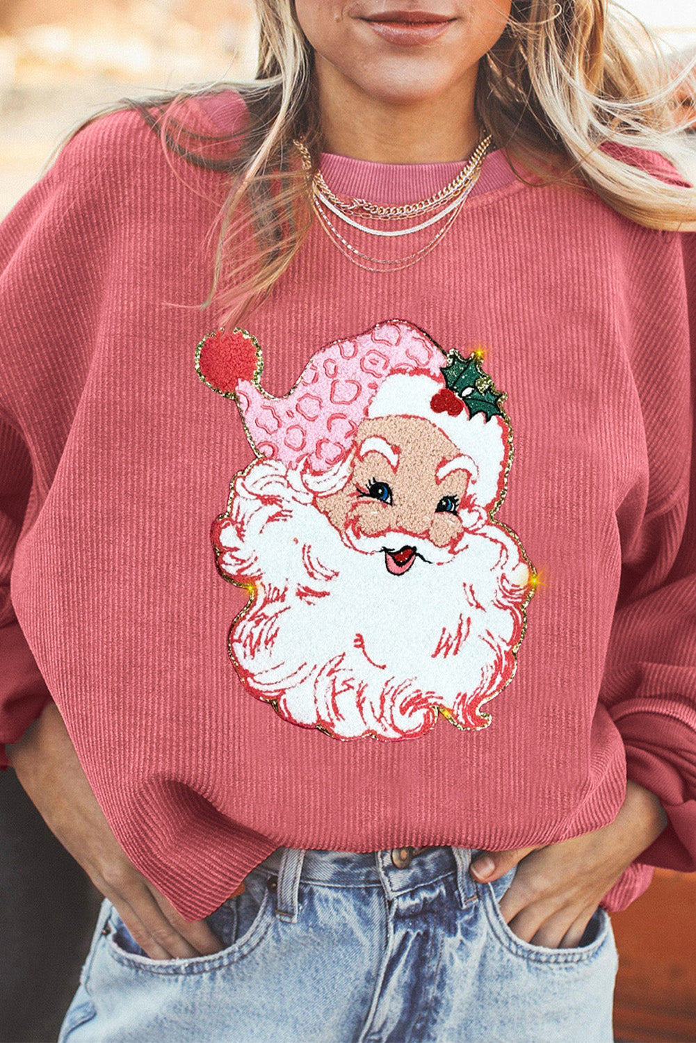 Sudadera con cuello redondo y cordón con destellos de Papá Noel en color rosa fresa